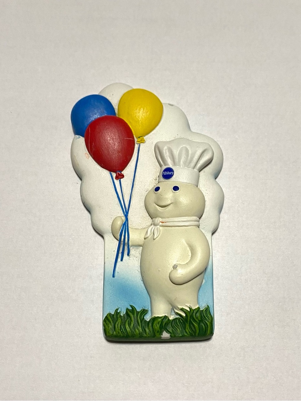 Pillsbury Doughboy magnet with balloons